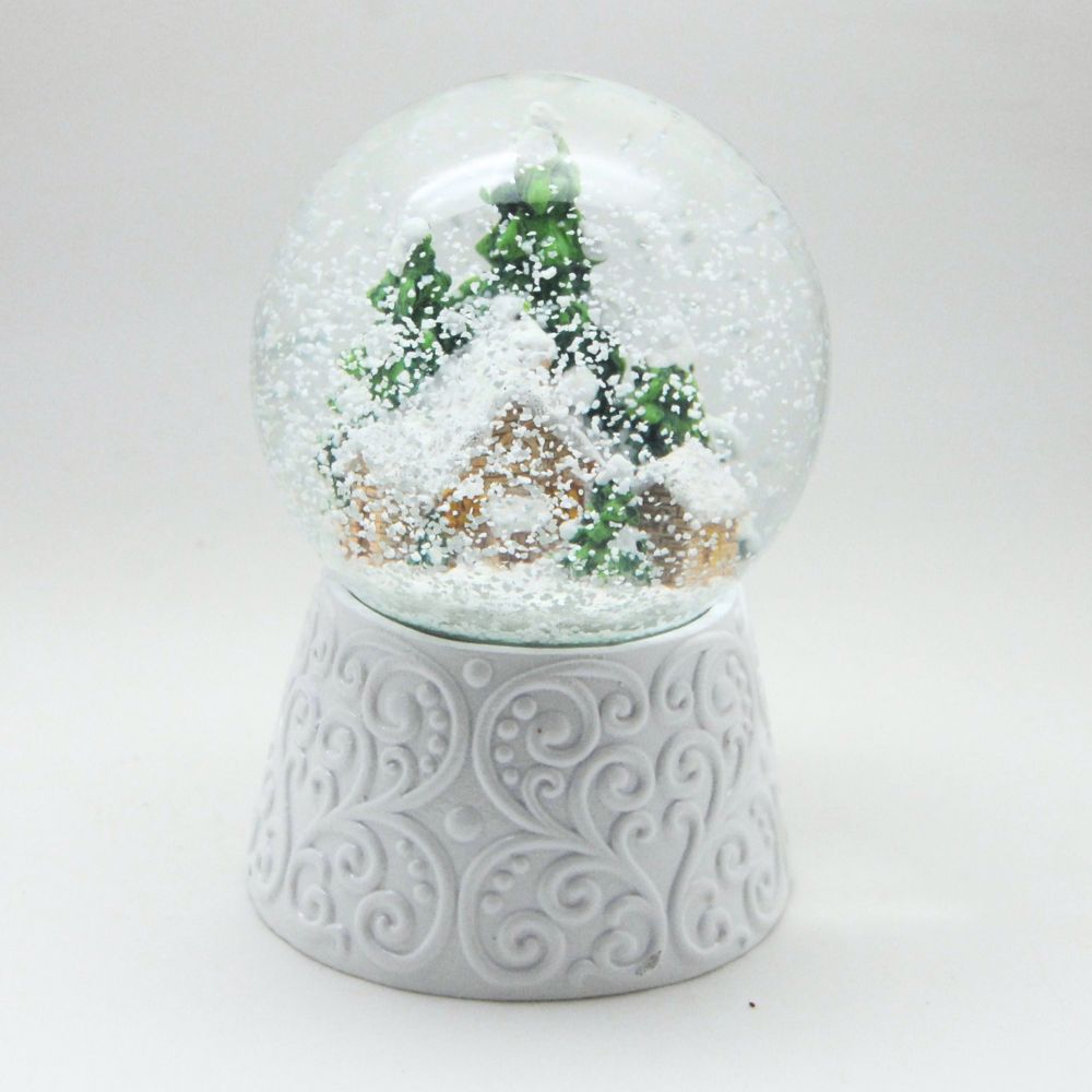 Edle Schneekugel Hüttenzauber Berghütte auf weißem Ornamentsockel 100 mm Durchmesser mit Spieluhr - Schneekugelhaus